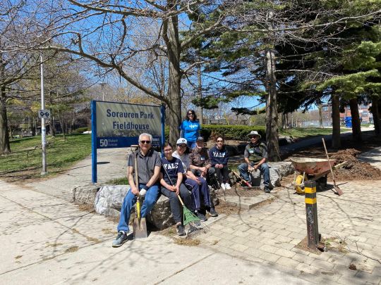 Photo of volunteers from Yale Alumni gathering outside the Sorauren Park Fieldhouse.
